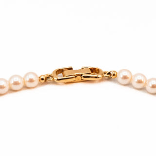 Vintage 16.5-Inch Simulated White Pearl Necklace With Gold Plated Accents