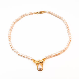 Vintage 16.5-Inch Simulated White Pearl Necklace With Gold Plated Accents