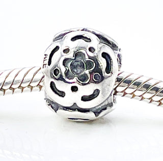 PANDORA Raised Flower Sterling Silver Charm With Salmon Zirconia