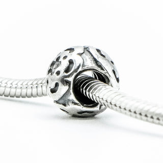 PANDORA Raised Flower Sterling Silver Charm With Salmon Zirconia