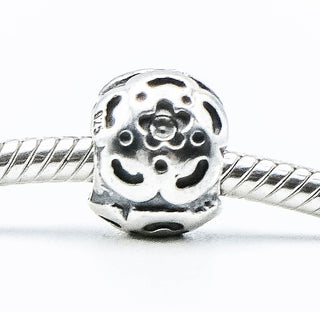 PANDORA Raised Flower Sterling Silver Charm With Salmon Zirconia