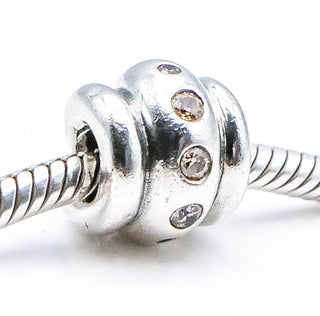 PANDORA Champagne Swirl Sterling Silver Charm With Champagne Zirconia