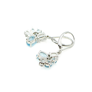 Sky Blue Topaz And Zircon Earrings in Sterling Silver