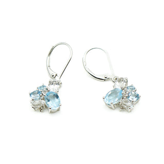 Sky Blue Topaz And Zircon Earrings in Sterling Silver