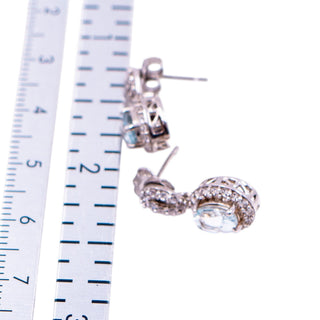 Sterling Silver 5/8 Inch Blue Topaz & Diamond Halo Drop Earrings