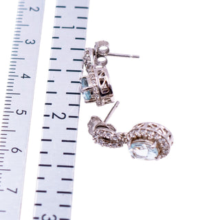 Sterling Silver 5/8 Inch Blue Topaz & Diamond Halo Drop Earrings