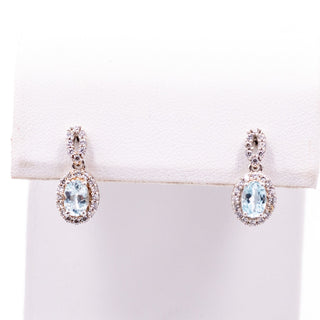 Sterling Silver 5/8 Inch Blue Topaz & Diamond Halo Drop Earrings