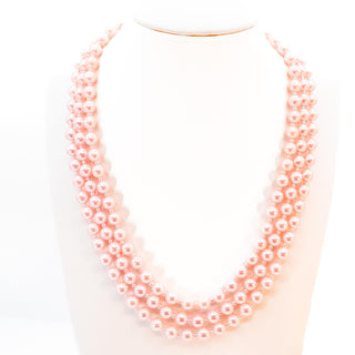 Vintage 19 to 22-Inch Simulated Pink Pearl Triple Strand Necklace
