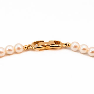 Vintage 16.5-Inch Simulated White Pearl Necklace With Gold Plated Accents