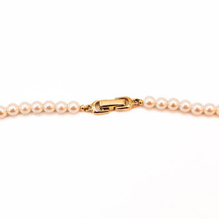 Vintage 16.5-Inch Simulated White Pearl Necklace With Gold Plated Accents