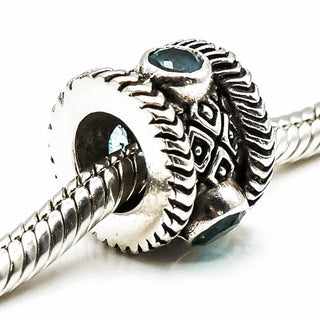 Ornate Blue Topaz Sterling Silver Charm