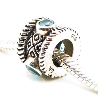 Ornate Blue Topaz Sterling Silver Charm