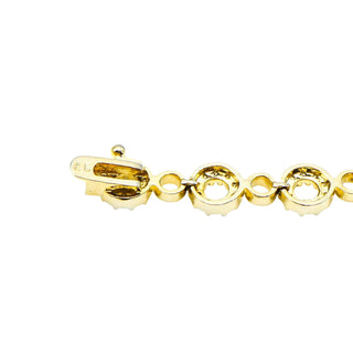 Infinity 7-Inch Tennis Bracelet in Gold Over Sterling Silver With CZ