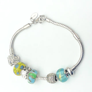 Sterling Silver Charm Bracelet With Sterling Silver Charms And Lobster Clasp