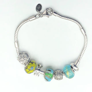 Sterling Silver Charm Bracelet With Sterling Silver Charms And Lobster Clasp