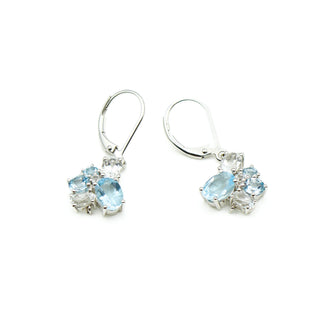 Sky Blue Topaz And Zircon Earrings in Sterling Silver